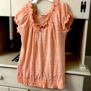 Pink stretchy shirt.